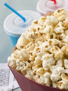 2168449-bucket-of-popcorn-with-soft-drinks-and-cinema-tickets